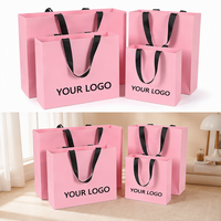 Sacs en papier noir mat de luxe écologiques personnalisés en gros, 250g, épais, avec logo en feuille, poignées en ruban, échantillonnage rapide, emballage de marque