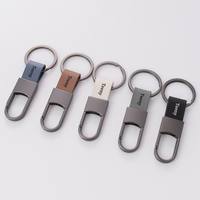 Nouveau porte-clés de voiture en cuir miniature durable avec logo personnalisé, finition mate, style professionnel, pendentif personnalisable gravable pour hommes et femmes