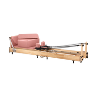 Reformer Pilates pliable en chêne commercial pour studio entraînement du tronc et gain de place