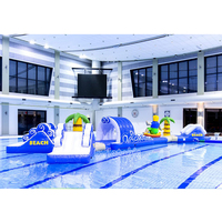 Parc aquatique gonflable commercial avec parcours d'obstacles et toboggan, thème plage, pour utilisation en extérieur EN14960