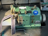 Machine à coudre à point de coquille à grande vitesse Merrow MG-3Q-3 d'occasion