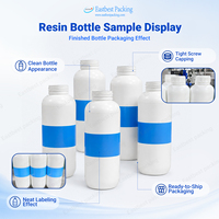 Ligne de production complète pour l'emballage de bouteilles en résine : Étiquetage automatique, décharge fluide des bouteilles, remplissage, bouchage et étiquetage