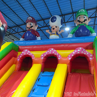 Château gonflable commercial Super Mario Bros pour enfants avec toboggan pour entreprise de divertissement gonflable certifié EN14960