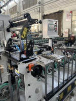 Machine de placage de cadres de portes électronique multifonctionnelle TC Machinery, colle thermofusible PUR, moteur, film PVC, puissance 25 kW, facile à utiliser