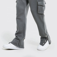 Desain Terbaru Polos Kargo Longgar Kustom Tombol Lebar Kaki Flare dengan Kantong Katun Organik Peregangan Merajut Unisex Celana Jogger Kasual