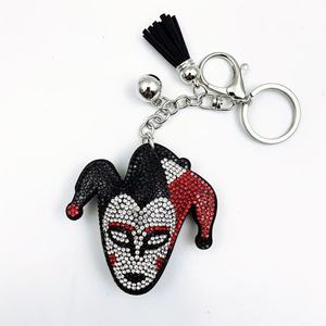 Porte-clés en métal à transfert thermique, style clown <span class=keywords><strong>de</strong></span> <span class=keywords><strong>dessin</strong></span> <span class=keywords><strong>animé</strong></span>, orné <span class=keywords><strong>de</strong></span> strass, avec pompon, tendance, style européen-américain transfrontalier - Product Image 2
