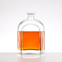 Bouteille de liqueur en verre incurvé de luxe de 750 ml avec bouchon en verre pour emballage personnalisé de brandy