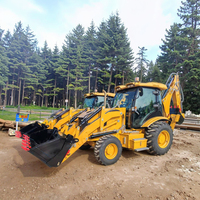 Chargeuse-pelleteuse similaire aux modèles CAT JCB homologuée CE, 75 kW, à châssis rigide, avec une charge nominale de 2500 kg
