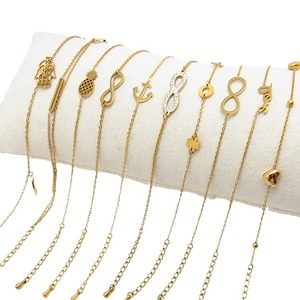 Pulsera de acero de titanio de 8 caracteres de alta calidad europea <span class=keywords><strong>americana</strong></span> para <span class=keywords><strong>mujer</strong></span>, eslabón de cadena de moda con pulseras chapadas en oro - Product Image 1