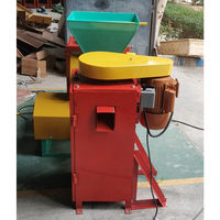 Machine à éplucher les fruits de grains de café par voie humide