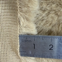 Tissu en fausse fourrure de lapin 100% polyester tricoté, doux, à motifs de lignes courbes en relief, pour jouets, vêtements, voitures et literie pour filles