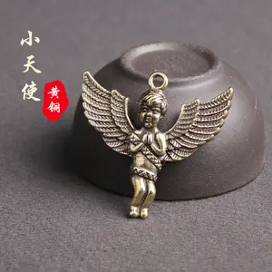 真鍮は古い小さな天使キーチェーンペンダント創造的な守護神の愛の人格ペンダントグランドストール銅商品卸売