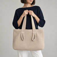 Sac à bandoulière en tricot avec logo personnalisé et poignées courtes et longues pour les collections d'accessoires urbains de marques de mode boutique