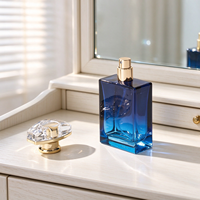 Flacon de parfum bleu dégradé en gros 50ml 1.7oz, base en verre épais, col doré brillant, bouchon arqué, emballage personnalisé