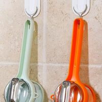 Moderne nieuwe handmatige multifunctionele schil- en schaafmes met opbergfunctie, huishoudelijk, van PP-materiaal, voor fruit en groenten.