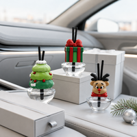 Diffuseur de parfum de voiture festif en verre de 11 ml avec figurine Père Noël et bâtonnets, pour l'aromathérapie automobile des fêtes, coffret cadeau
