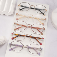 Bingkai Kacamata Optik Logam Bulat Unisex Vintage dengan Gagang Berwarna Kontras Bergaris untuk Kacamata Resep Remaja Grosir 6611