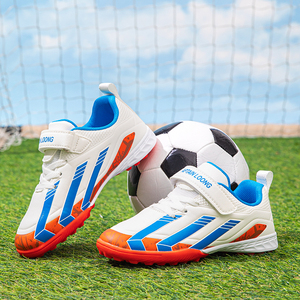 Chaussures de football d'entraînement professionnelles Cema pour enfants, nouveau modèle, antidérapantes, tige <span class=keywords><strong>synthétique</strong></span> à pointes cassées, chaussures de football unisexes - Product Image 1