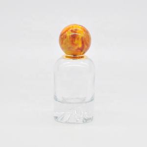 Botella de perfume de cristal de 50ml, embalaje cosmético de alta calidad, cuello engarzado, con tapa de piedra, diseño especial de lujo, venta al por mayor - Product Image 1