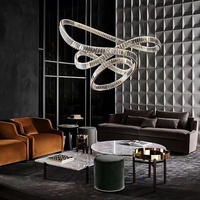 Lustre en cristal minimaliste de style italien Luminaire de luxe pour escalier à haut plafond Villa Duplex Loft Hôtel Anneau Ruban Fer