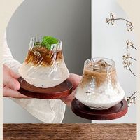 PFAS-vrij, loodvrij, food-grade, hoog borosilicaatglas, Fuji-bergvormig, aanpasbaar tumbler, met handgesneden reliëfstructuur