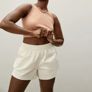 Pantaloncini Casual bianchi in bianco leggero ad asciugatura rapida all'ingrosso pantaloncini da Yoga sportivi in tessuto elastico in vita da donna