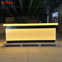 Comptoir de bar portable solaire en pierre d'onyx LED haut de gamme, mobilier de bar musical et de danse en Corian pour boîte de nuit