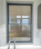 Fenêtre à double battant en aluminium OEM ODM, fenêtre coulissante verticale pour projets d'appartements et d'hôtels