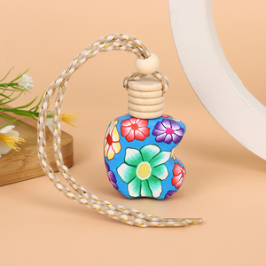 Botella de perfume de coche recargable con cubierta de arcilla suave, flor mixta, difusor colgante personalizado para ambientador y decoración de coche - Product Image 6