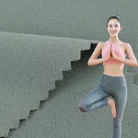 Fabricants de tissu de vêtements de yoga nu à haute élasticité et ponçage double face leggings de sport tissu de yoga