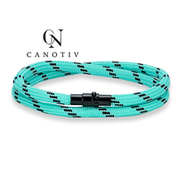 Bracelet en paracorde double couche turquoise et noir à rayures, avec boucle à dégagement rapide, pour sports de plein air, bracelet en corde tressée pour couple