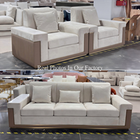 Ensemble de canapés de luxe moderne sur mesure 1+3 places en tissu avec table d'appoint intégrée pour villa et salon de direction