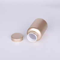 Bouteilles en plastique PET sablées or métallique 150cc Emballage de qualité supérieure pour suppléments de santé Capsules vitaminées Comprimés