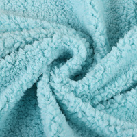 Dernière conception de fausse fourrure de mouton, d'agneau, Polyester artificiel épaissi effet chaud tricoté tissu polaire Sherpa pour vêtement/