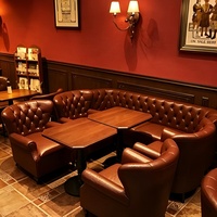 Fauteuil pivotant moderne en similicuir capitonné avec roulettes pour bar, hôtel et repas en plein air