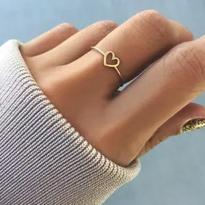 Женские кольца в форме сердца