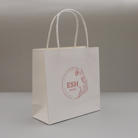 Sacs de shopping en papier kraft recyclable de luxe avec poignée longue, impression personnalisée, papier artistique, logo personnalisé, cosmétiques, parfums, bijoux