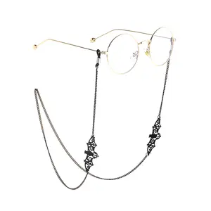 Gafas de sol de metal antideslizantes y cruzadas, populares, de comercio electrónico, con colgante de murciélago hueco negro, cadena de gafas hecha a mano