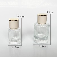 Étiquettes de parfum personnalisées de luxe, flacons de parfum vides en verre cylindrique transparent, 30 ml/50 ml/100 ml, avec bouchon, vaporisateur, boîte