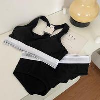 Set Bra dan Celana Dalam Wanita Model Racerback dengan Bantalan Lepas Pasang, Bahan Katun Bernapas, Grosir Langsung dari Pabrik, Ukuran S-XL, Warna Hitam Putih Abu-abu
