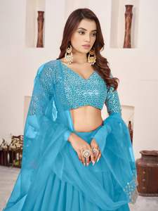 Lehenga bleu fluide et moderne, confectionné en géorgette douce, bordure en dentelle richement ornée de sequins argentés, élégance royale et brillance pour mariage, prix de gros - Product Image 4