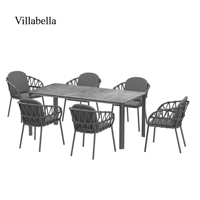 Ensemble de salle à manger d'extérieur moderne 7 pièces avec structure en aluminium, table en pierre frittée et chaises en corde tressée pour patio de complexe hôtelier