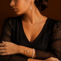 EMANCO Ensemble d'accessoires empilables en acier inoxydable style minimaliste avec accent perle, colliers chaîne cubaine, bracelets et boucles d'oreilles pendantes