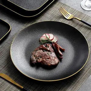 Precio de fábrica, venta al por mayor, plato plano para servir con borde dorado de gres, platos negros de cerámica mate, plato de cena para cafetería, restaurante - Product Image 5
