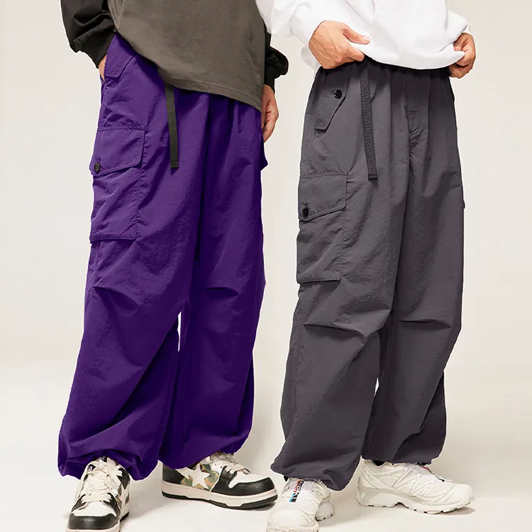 Streetwear da uomo con tasca pantaloni larghi da paracadutista 2024 primavera/estate nuova moda in generale da donna larghi pantaloni Cargo Casual da uomo