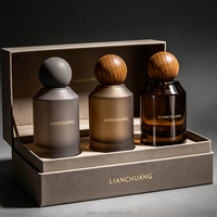 Flacon de parfum en verre cylindrique vert mat de luxe vide avec bouchon à bille en bois et bouchon à bille en métal, bouchon personnalisé et coffret cadeau