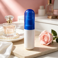 Flacon pulvérisateur blanc en PET de 50 ml avec bouchon bleu, col de 20 mm, pour la distribution de liquides cosmétiques