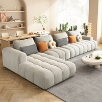 Sofá Modular de Alta Gama Color Crema Suave para Sala de Estar en Forma de L, Puff Tipo Nube, Sofá Moderno de Lujo en Terciopelo para el Hogar