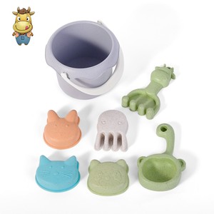 Wholesale Wheat Straw Beach Toy Set 7pcs <b>Kids</b> Bucket with Animal Claw Rake <b>Watering</b> <b>Can</b> Sea Animal Moulds Mesh Bag - Product Image 1