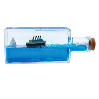 Bouteille flottante décorative, très vendue, pour tableau de bord de voiture, décompression, avec liquide en forme de goutte d'huile et de navire de croisière